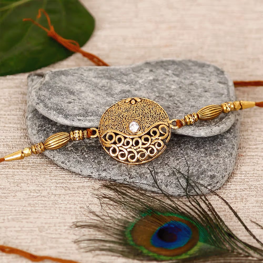 Large Rakhi Large Designer Gold Rakhi with Roli Chawal – Godavari Vantillu